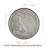 A 1934-S Walking Liberty Half Dollar coin in average circulated condition reverse side of coin