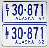 A pair of antique unused 1962 Alaska light truck license plates for sale by Brandywine General Store in near mint condition with wrapper