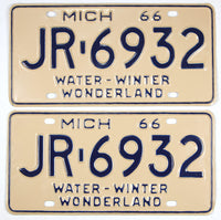A pair of classic NOS 1966 Michigan passenger automobile license plates for sale by Brandywine General Store in unused excellent condition