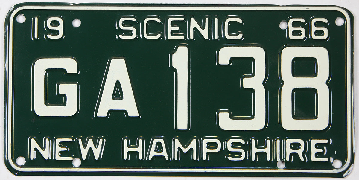 Vintage New Hampshire license plate from 1966 with the text 'SCENIC 66' and 'GA 138'.
