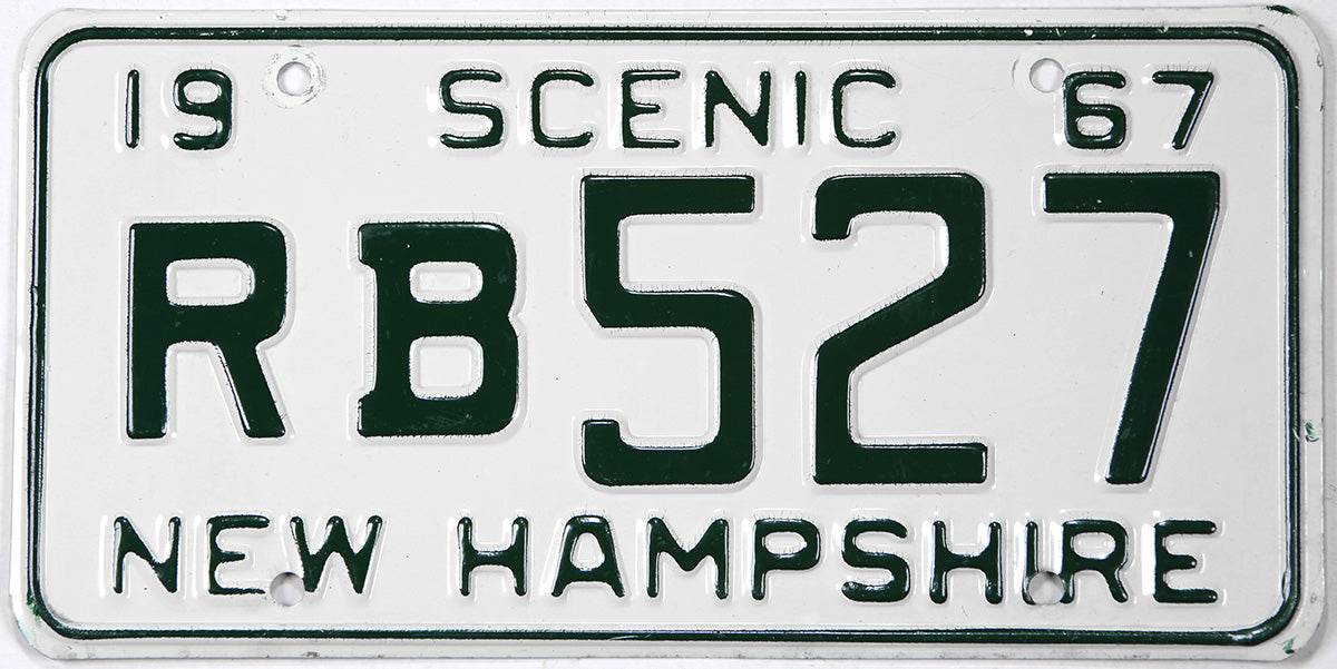 Vintage New Hampshire license plate with text '1967 Scenic RB527' on a white background