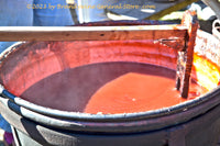An original premium quality art print of Stirring Apple Butter in Copper Kettle for sale by Brandywine General Store