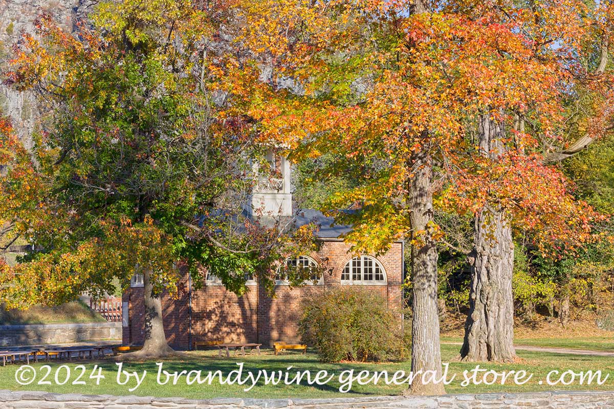 art print of back side of John Browns fort nestled in fall leaves Harpers Ferry WV