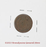 An 1883 Indian Head Penny in good condition with edge nick Reverse side