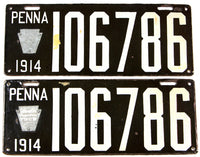 An Antique porcelain pair of 1914 Pennsylvania passenger car license plates for sale at Brandywine General Store in very good plus condition with the keystone tabs