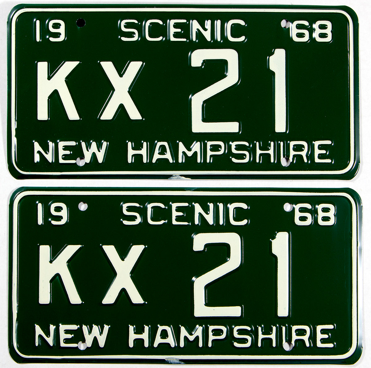 A pair of 1968 New Hampshire car license plates in excellent plus condition with original wrapper