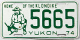 A 1974 Yukon passenger car license plate in very good plus condition