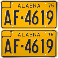 A pair of unused 1975 Alaska Truck License Plates for a non commercial truck for sale by Brandywine General Store in near mint condition
