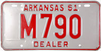 An antique 1961 Arkansas dealer license plate which is in unused NOS excellent condition