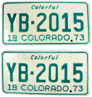 An unused classic pair of 1973 Colorado passenger car license plates for sale by Brandywine General Store in excellent condition