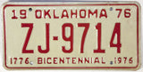 An Oklahoma license plate commemorating the Bicentennial of the United States in 1976 for sale by Brandywine General Store in excellent condition