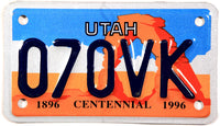A scenic 1996 Utah motorcycle license plate commemorating the centennial of the statehood of Utah for sale by Brandywine General Store in unused near mint condition