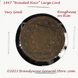 An 1847 Braided Hair Large Cent in very good condition with some rim chips for sale by Brandywine General Store