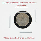 An 1852 Silver Three Cent Piece Trime in very good condition