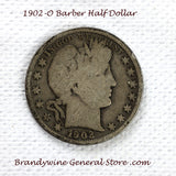 A 1902-O Barber Half dollar coin in good condition with scratches for sale by Brandywine General Store