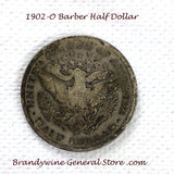 A 1902-O Barber Half dollar coin in good condition with scratches for sale by Brandywine General Store reverse of coin