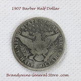 A 1907 Barber Half dollar coin in good condition for sale by Brandywine General Store reverse side of coin