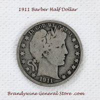 A 1911 Barber Half dollar coin in good plus condition for sale by Brandywine General Store.