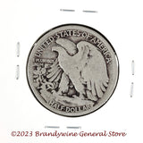 A 1917 Walking Liberty Half Dollar coin in good plus condition reverse of coin