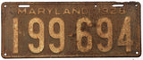A 1928 Maryland car license plate for sale by Brandywine General Store in poor condition