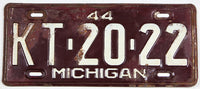 An antique 1944 Michigan car license plate in good plus condition
