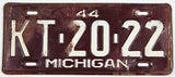 An antique 1944 Michigan car license plate in good plus condition