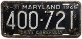 An antique 1945 Maryland passenger car license plate for sale at Brandywine General Store. in good condition with tack holes
