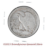 A 1946-S Walking Liberty Half Dollar coin in average circulated condition reverse side of coin