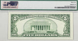 A FR #1961-D 1950 series five dollar United States Federal Reserve Note graded by PMG at 65 Gem Uncirculated reverse of bill