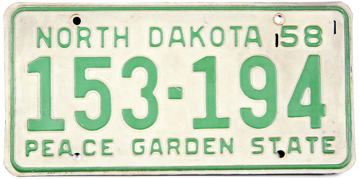 Antique 1958 North Dakota car license plate grading very good with some darkening