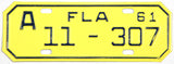 A classic NOS 1961 Florida motorcycle license plate for sale by Brandywine General Store from Alachua county in excellnt plus condition
