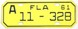 A classic NOS 1961 Florida motorcycle license plate for sale by Brandywine General Store from Alachua county in near mint condition