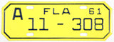A classic NOS 1961 Florida motorcycle license plate for sale by Brandywine General Store from Alachua county in near mint condition