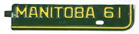 Green license plate metal tab with 'Manitoba 61' text