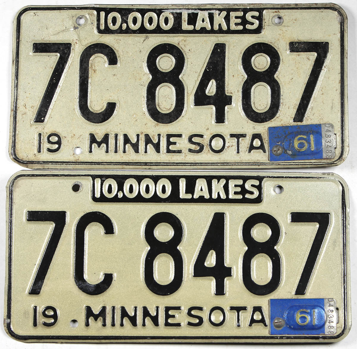 Classic pair 1961 Minnesota car license plates grading an average of very good minus