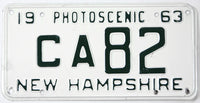 Vintage New Hampshire license plate from 1963 with 'Photoscenic' text