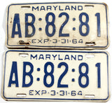 A pair of classic 1964 Maryland car license plates for sale by Brandywine General Store with one very good plus the other in fair condition