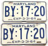 A pair of classic 1964 Maryland car license plates in very good condition with bends