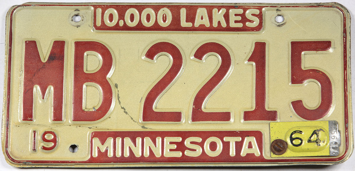 Classic 1964 Minnesota car license plate grading very good with bends