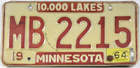 Classic 1964 Minnesota car license plate grading very good with bends