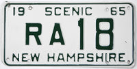 Vintage New Hampshire license plate from 1965 with 'Scenic' and 'RA 18' text.