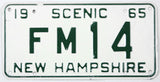 Vintage New Hampshire license plate with text '1965 Scenic FM14' on a white background