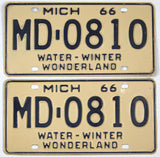 A pair of classic 1966 Michigan passenger automobile license plates for sale by Brandywine General Store in very good plus condition