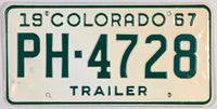 1967 Colorado trailer license plate in excellent minus condition with original mailing envelope with yellowing on the right side