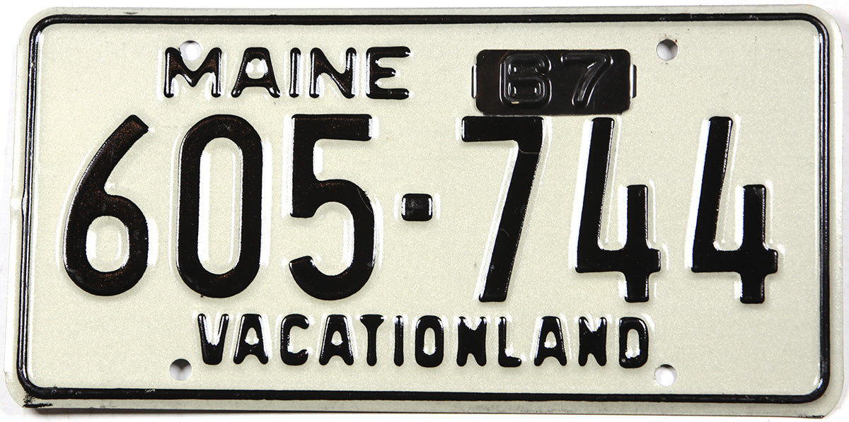 vintage 1967 Maine car license plate with desirable metal tab grading excellent plus