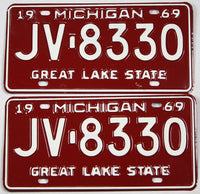 A pair of new old stock 1969 Michigan passenger automobile license plates for sale by Brandywine General Store in excellent unused condition