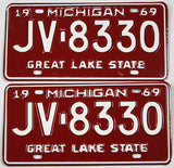 A pair of new old stock 1969 Michigan passenger automobile license plates for sale by Brandywine General Store in excellent unused condition