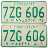 Pair of vintage 1971 Minnesota car license plates with green text on a white background.