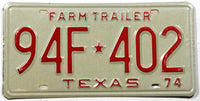 A Classic NOS 1974 Texas Farm Trailer License Plate in excellent minus condition