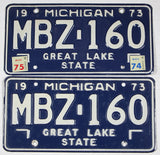 A pair of classic 1975 Michigan Car License Plates for sale by Brandywine General Store in excellent minus condition